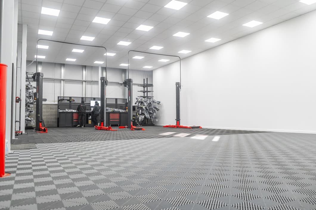 Maxton Design professional body kit fitting bay with car lifts