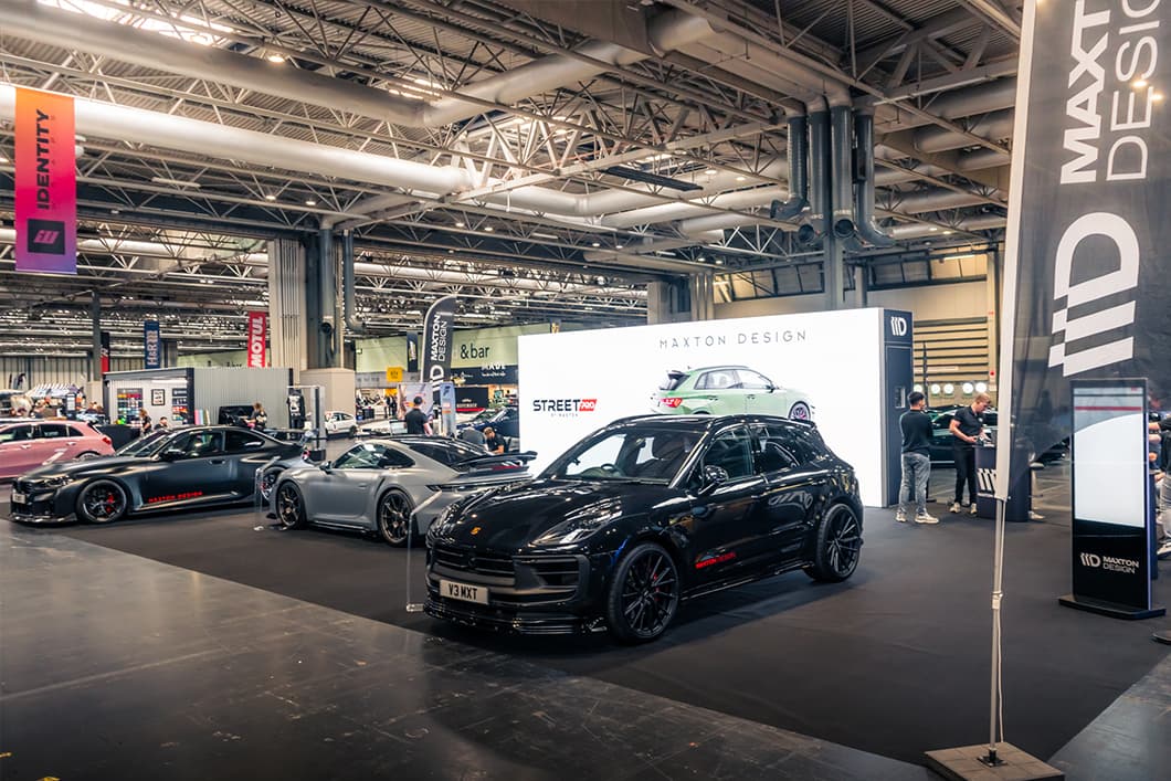 Maxton Design stand at Street Car Show with modified Porsche Cayenne and BMW on display